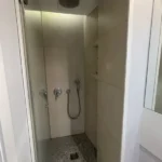 Modern student room in Eixample Barcelona with shared terrace, central AC and furnished apartment