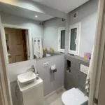 Modern student room in Eixample Barcelona with shared terrace, central AC and furnished apartment