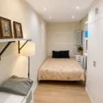 Modern student room in Eixample Barcelona with shared terrace, central AC and furnished apartment