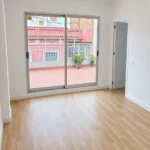 2-bedroom student apartment in Gràcia Barcelona with sunny 12 m² terrace and equipped kitchen